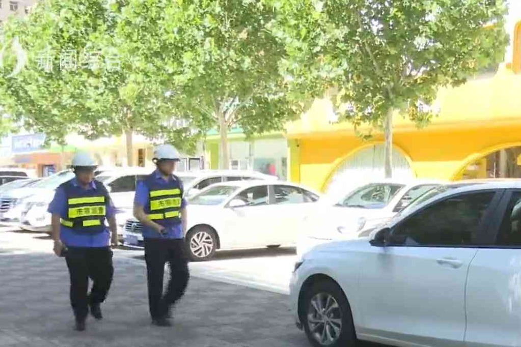 整治停车乱象 全力还路于民